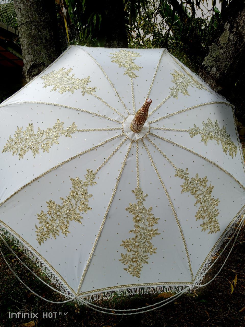 Muthu kuda/ muthu umbrella / umbrella. 