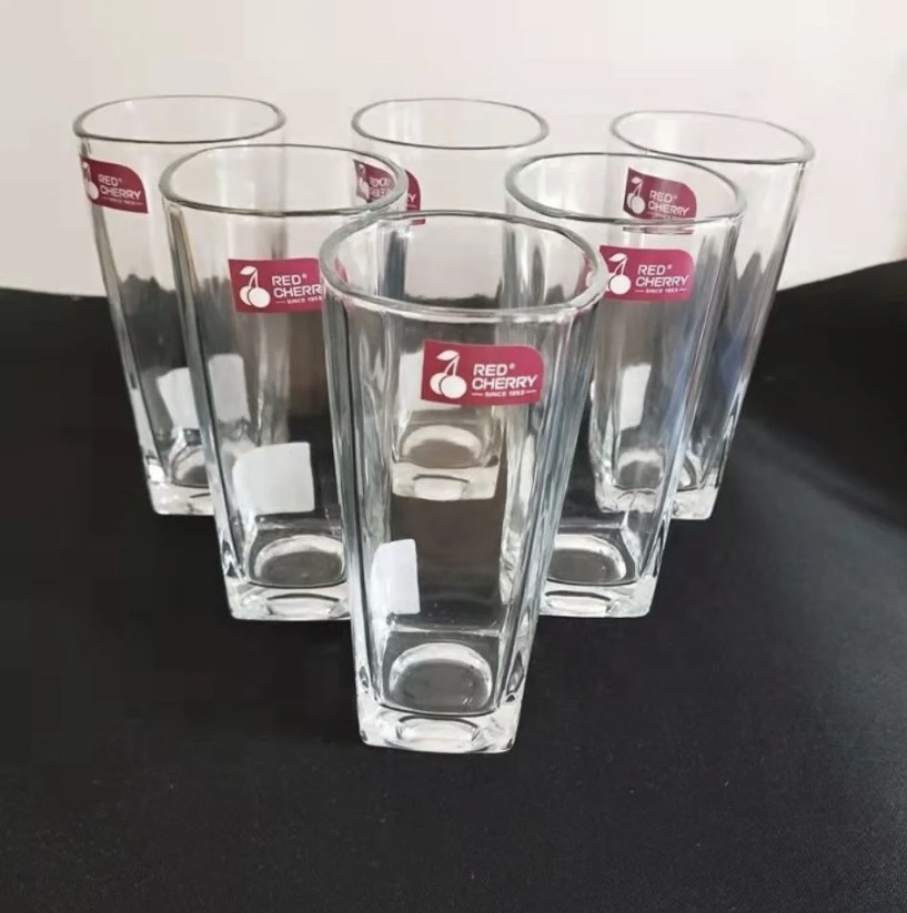 6 PIECE GLASS SET. DRINKING GLASS. BOTTOM SQUARE SHAPE