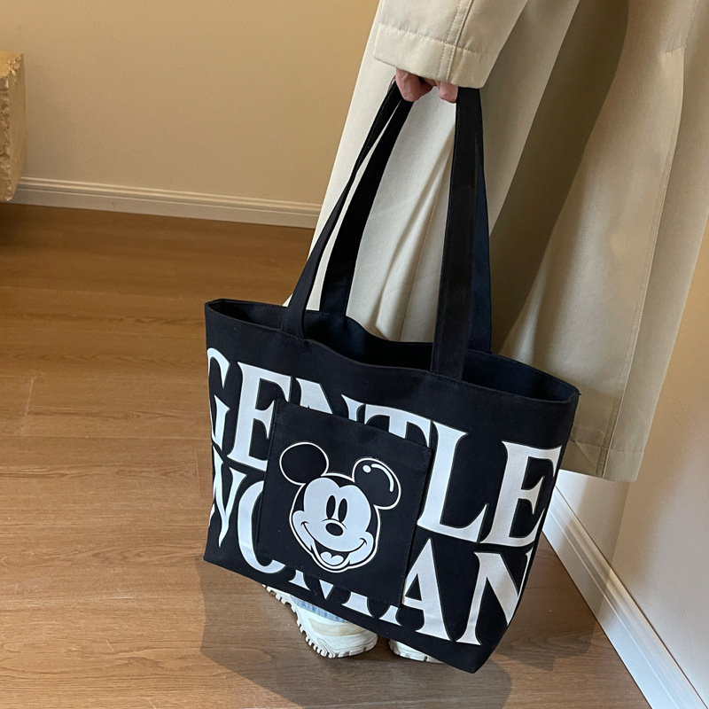 Disney Large Capacity Canvas Bag Women's 2024 New Trendy Cartoon Mickey Tote Bag College Student Class Shoulder Tote Bag. 
