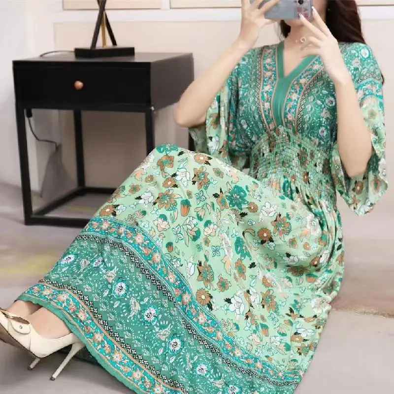 2025 Summer New Casual Elegant Retro Bohemian Style V-neck Elastic Waist Large Swing Printed Long Skirt Autumn Summer Dress. 