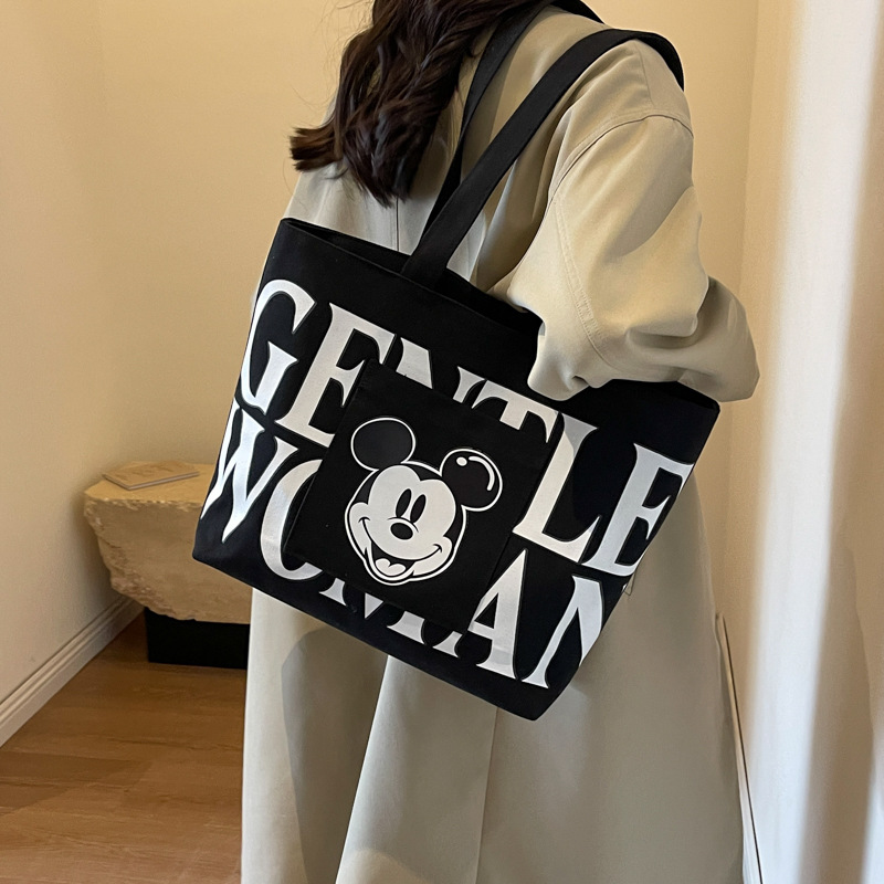 Disney Large Capacity Canvas Bag Women's 2024 New Trendy Cartoon Mickey Tote Bag College Student Class Shoulder Tote Bag. 
