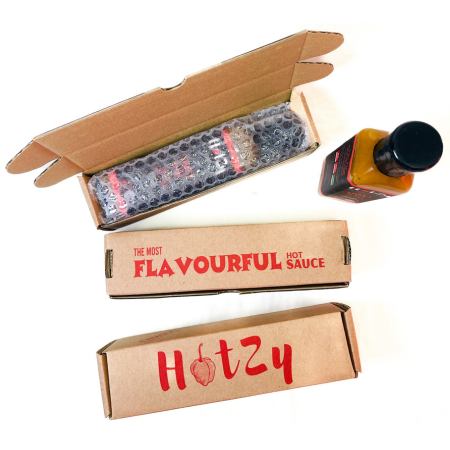 Hotzy 250ml Snake Bite Hot Sauce made with Pineapple- A rich pineapple based Hot sauce made with Scotch Bonnet Nai Miris. 